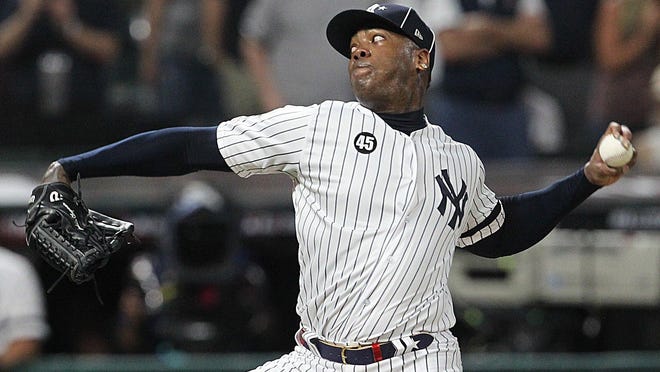 New York Yankees pitcher Aroldis Chapman oitches  in the ninth inning of the 2019 All-Star Game in Cleveland.