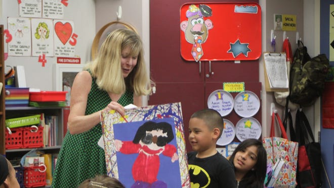 Students in Lisa Cronk's kindergarten class painted a portrait of their moms for a Mother's Day tea on May 6, 2015.
