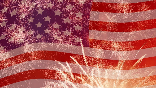 fireworks over United States flag