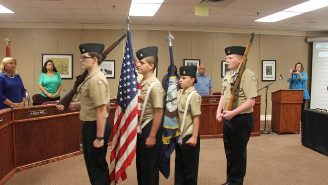 South Side High School's Navy Junior Reserve Officers Training Corps presents the colors Tuesday at a meeting of the Jackson-Madison County School Board.