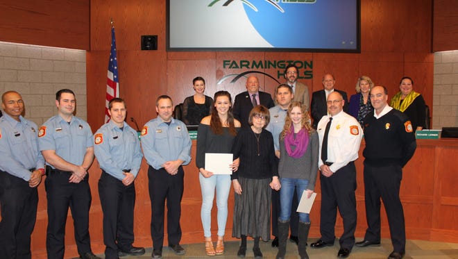The Farmington Hills City Council presented a special Life Saving Award to Costick Center lifeguards Kira Hadden and Emily Mayoras.