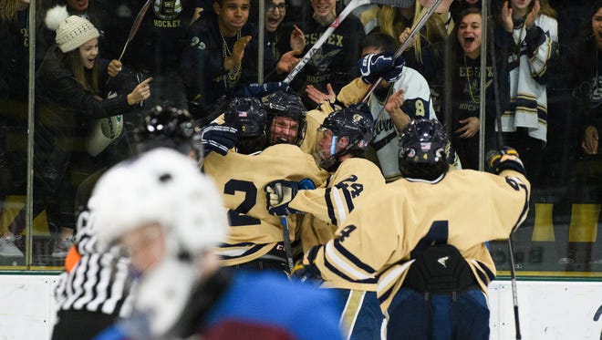 Essex celebrates a goal during the Vermont state division I boys hockey championship game between Spaulding and Essex at Gutterson Fieldhouse on Monday evening March 19, 2018 in Burlington.