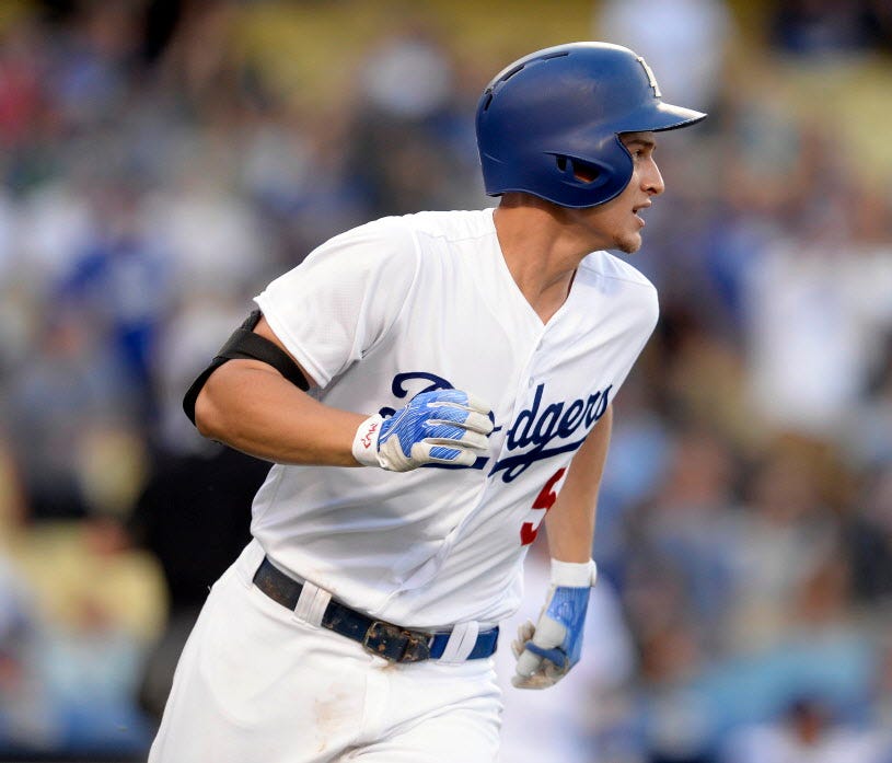Los Angeles Dodgers shortstop Corey Seager (5) runs after hitting a solo home run in the first inning against the San Francisco Giants at Dodger Stadium.
