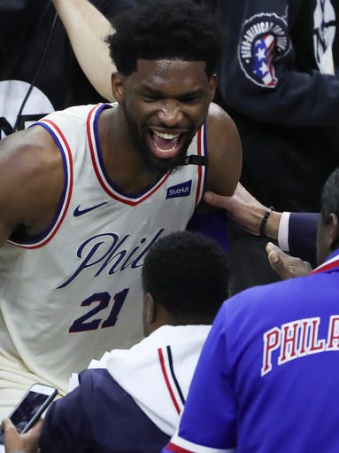 Sixer Joel Embiid celebrates after the Sixers' 104-91