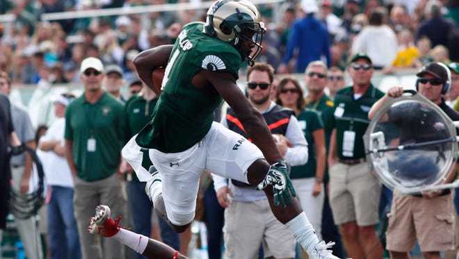 CSU receiver Michael Gallup, top, jumps over Fresno State defensive back Jamal Ellis on the way to a touchdown earlier this season. Gallup is the Mountain West's leading receiver in conference games and has been key to the Rams' success.