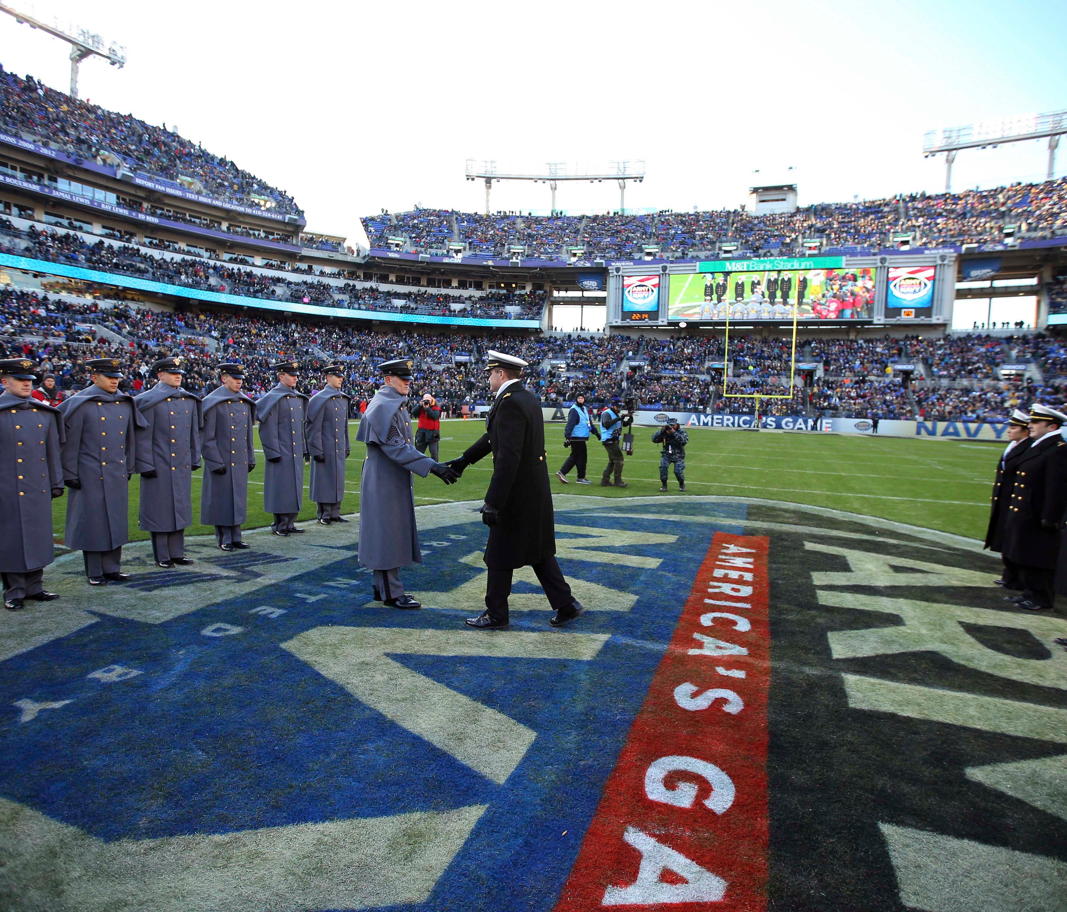 Cadets from West Point and Midshipmen from the Naval Academy participate in a ceremony before the 117th Army-Navy game in 2016.