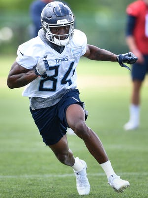 Titans wide receiver Corey Davis runs a route during practice in May.