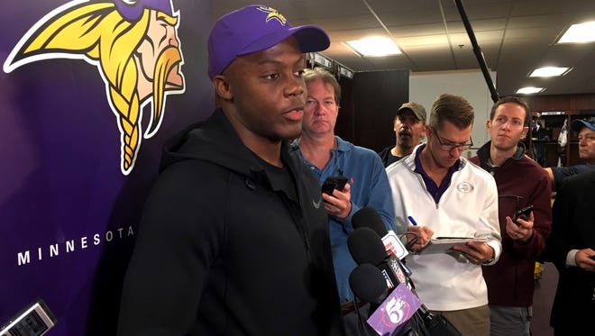 Minnesota Vikings quarterback Teddy Bridgewater meets with the media before during NFL football practice Thursday, Oct. 19, 2017, in Eden Prairie, Minn. He was cleared to rejoin the team Wednesday on the field where he dislocated his left knee and tore multiple ligaments in a non-contact drill less than two weeks before the 2016 season began. (AP Photo/Dave Campbell)