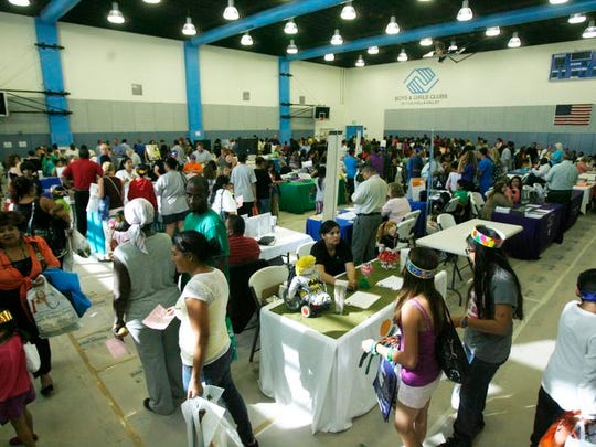 Residents attend a health fair held by the Borrego Community Health Foundation at the Desert Hot Springs Community Health and Wellness Center in 2013.