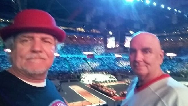 Maurice Dowd, right, and Joey Dowd at the final game at Joe Louis Arena on April 9, 2017.