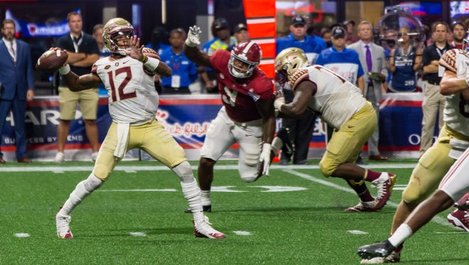 Florida State Quarterback Deondre Francois (12) threw for 210 yards and a touchdown but leaves the game early due to a season ending injury as #3 FSU falls to #1 Alabama by a score of 24-7 at Mercedes Benz Stadium in Atlanta, Ga on Sept. 2nd, 2017.