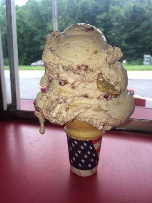 A heaping helping of Huckleberry Buckle ice cream served at Cliff’s Homemade Ice Cream, Ledgewood.