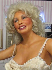 A Dolly Parton look-a-like is one of around 60 wax