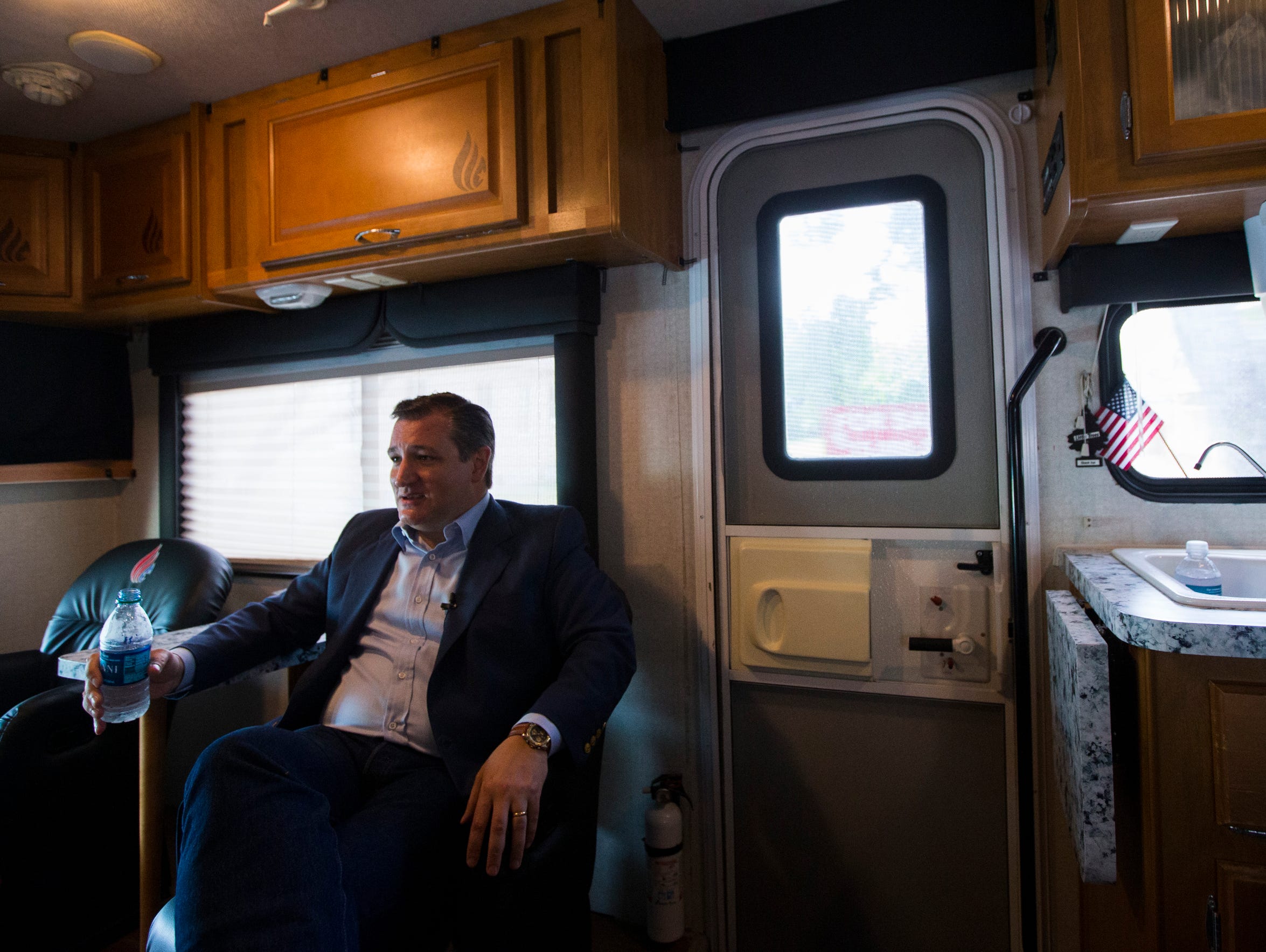 U.S. Sen. Ted Cruz rides in his campaign bus following