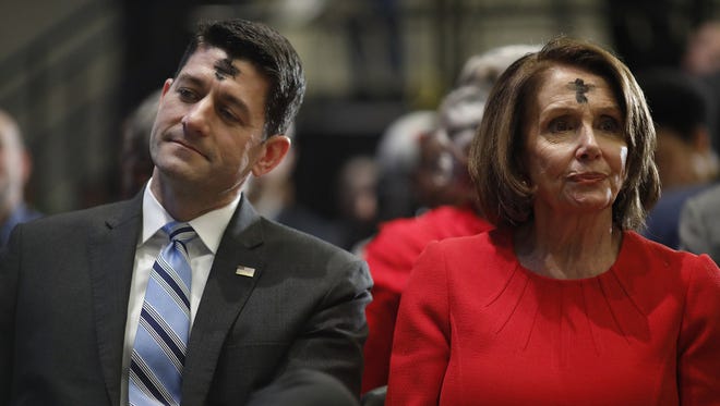 Speaker of the House Paul Ryan (R-Wis.) and House Minority Leader Nancy Pelosi (D-Calif.) sit together at an event honoring the bicentennial of Frederick Douglass' birth Wednesday in Washington, D.C.