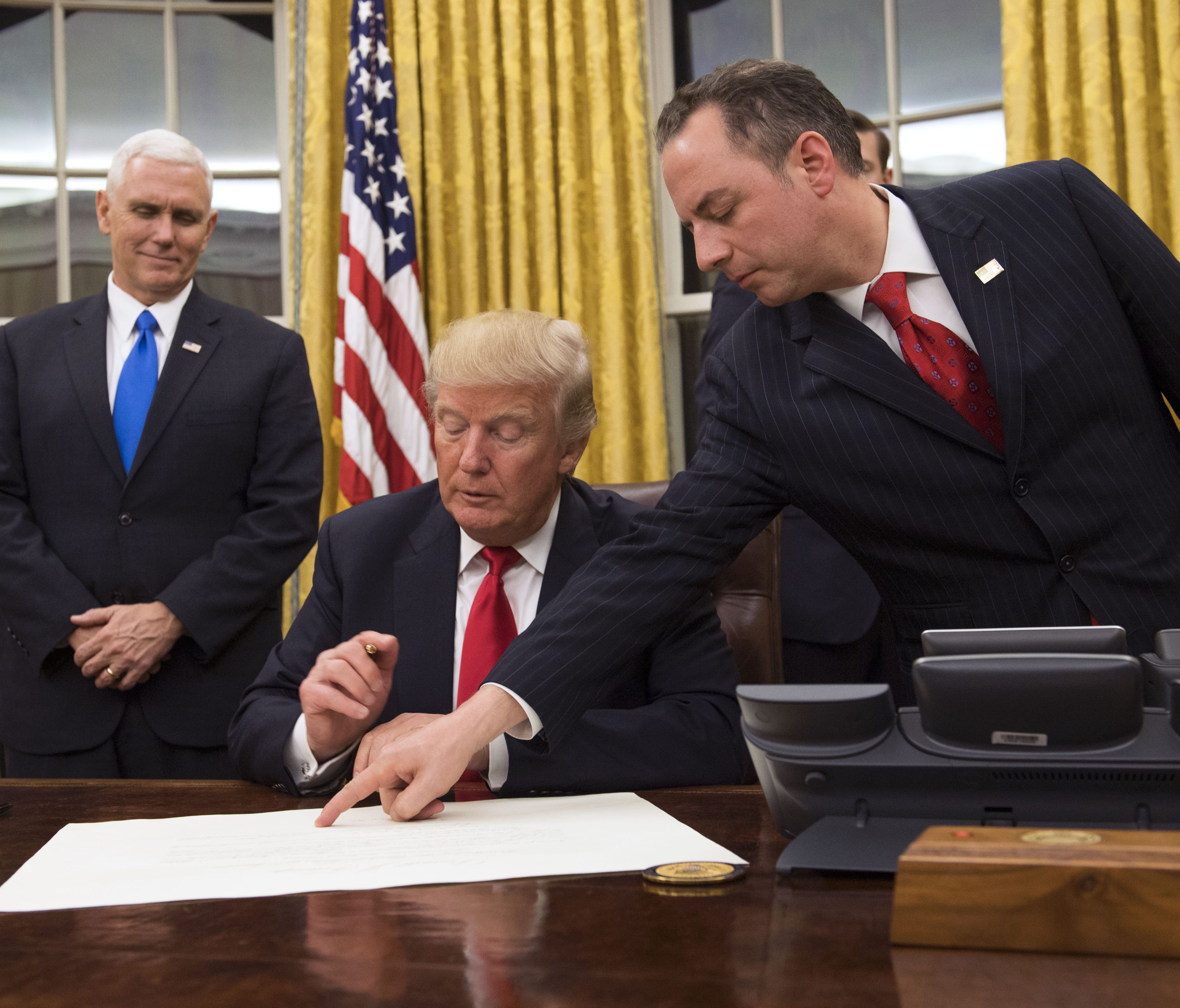 White House chief of staff Reince Priebus, at right, with President Trump and Vice President Pence.