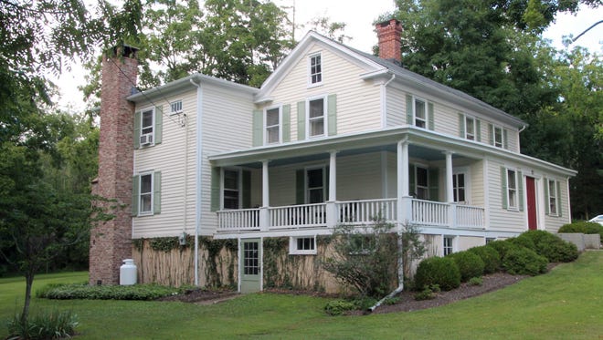 This four-bedroom Clinton home has two porches, an updated kitchen and multi-zone heating.