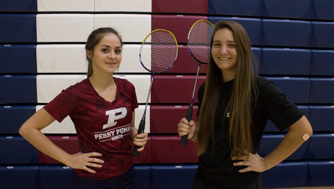 Gilbert Perry High School badminton players Megan Crow (left) and Jillian Lagasca.