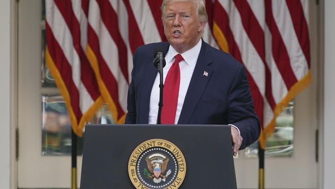 President Donald Trump answers questions from reporters during an event on protecting seniors with diabetes in the Rose Garden White House, Tuesday, May 26, 2020, in Washington. (AP Photo/Evan Vucci)