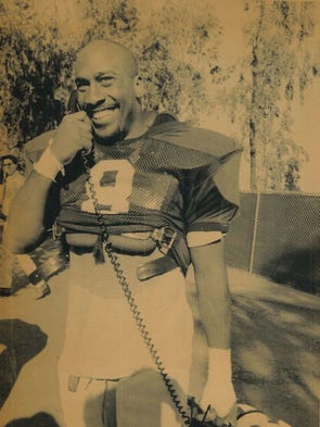 Iowa's Leroy Smith talks to a recruit from his hometown