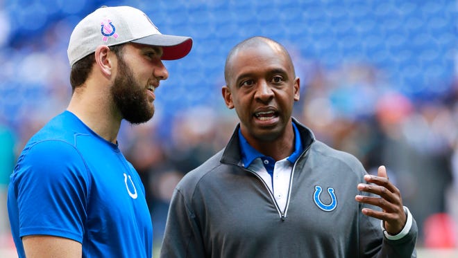 Indianapolis Colts quarterback Andrew Luck, left, talks with then-offensive coordinator Pep Hamilton in October 2015.