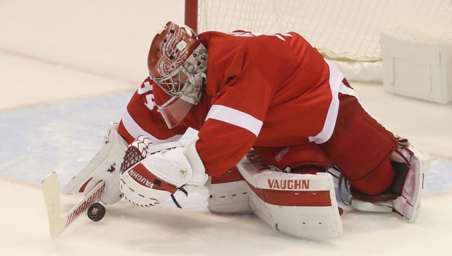 Detroit Red Wings goalie Petr Mrazek makes a save during third-period action against the Carolina Hurricanes on Tuesday, Oct. 25, 2016 at Joe Louis Arena in Detroit.