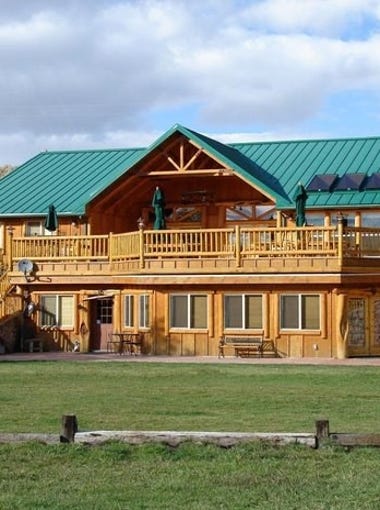 The Cottonwood Guest Ranch is a working cattle ranch with luxurious lodge accommodations for 19 guests.