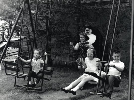 Sister Seraphine Herbst with Holy Childhood children in 1965.