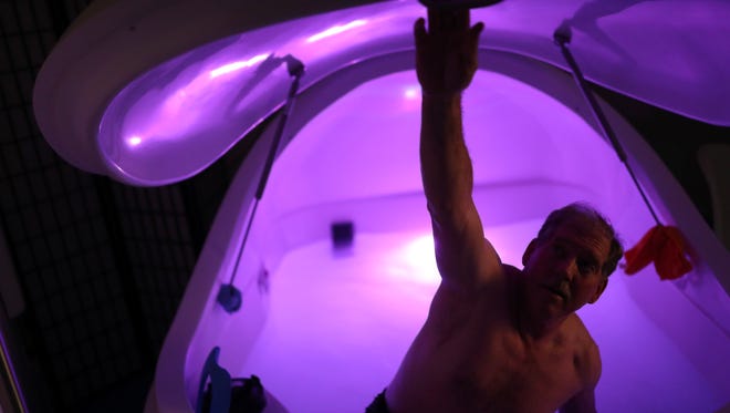 Lawton Langford enters the sensory deprivation pod at Driftaway Float Center on Wednesday, Nov. 29, 2017. “It was terrifying because I was left with nothing but my mind,” Langford said about his first experience in the pod. “Until you get comfortable in there, that’s when the magic starts.”