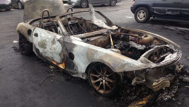 A fire Monday morning destroyed a 2007 BMW awaiting repairs at a Metro Parkway repair shop.