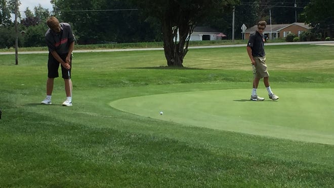 Harding's Kameron Hall putts on the 18th hole at Valley View Golf Course Monday during a Heart of Ohio Junior Golf Association tournament.