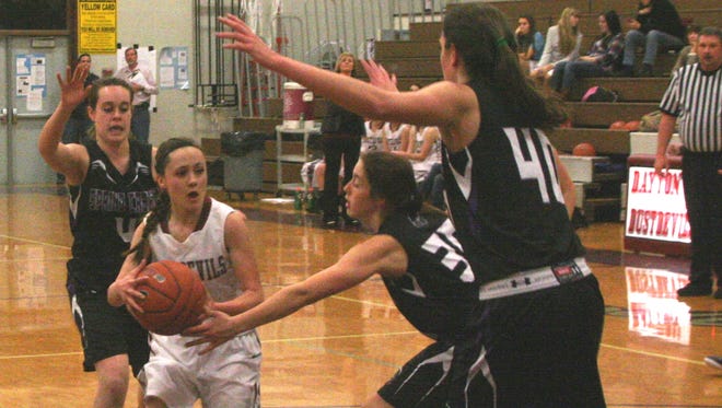 Dayton’s Christina Ricci drives to the basket during last Friday’s game against Spring Creek.
