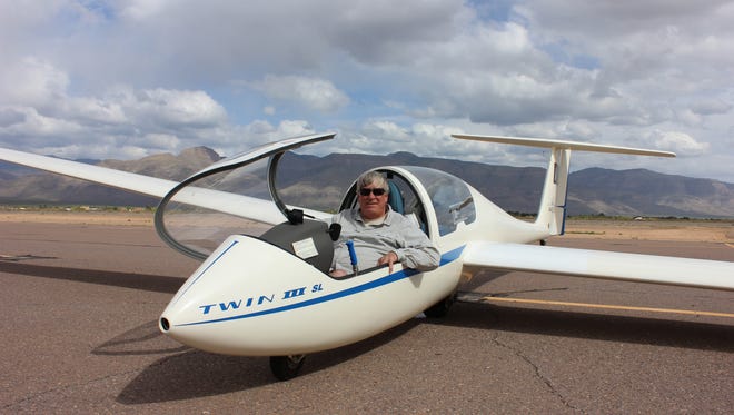 White Sands Soaring Association chief instructor and glider pilot Lance Grace sits in the Grob 103C Twin III SL, named DL, after David and Louis Braddi, the former owners of the plane. Louis Braddi donated the glider after his son David Braddi passed away from esophageal cancer last year.