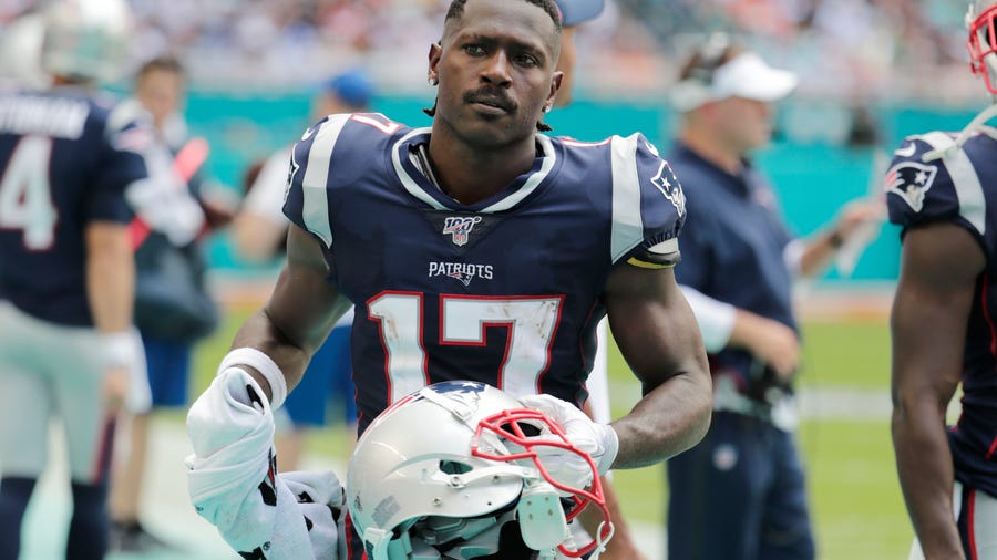 FILE - In this Sunday, Sept. 15, 2019, file photo, New England Patriots wide receiver Antonio Brown (17) stands on the sidelines during the first half at an NFL football game against the Miami Dolphins in Miami Gardens, Fla. Nike has dropped New England Patriots receiver Antonio Brown, Nike spokesman Josh Benedek told The Associated Press on Friday, Sept. 20, 2019. The move comes after a second woman accused Brown of sexual assault.  (AP   Photo/Lynne Sladky, File)