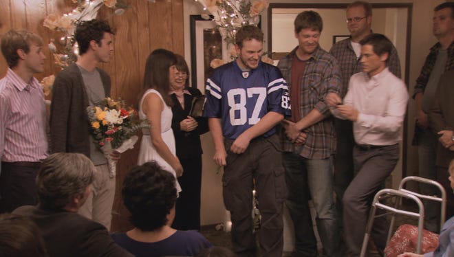 Andy Dwyer gets married in a Reggie Wayne jersey.