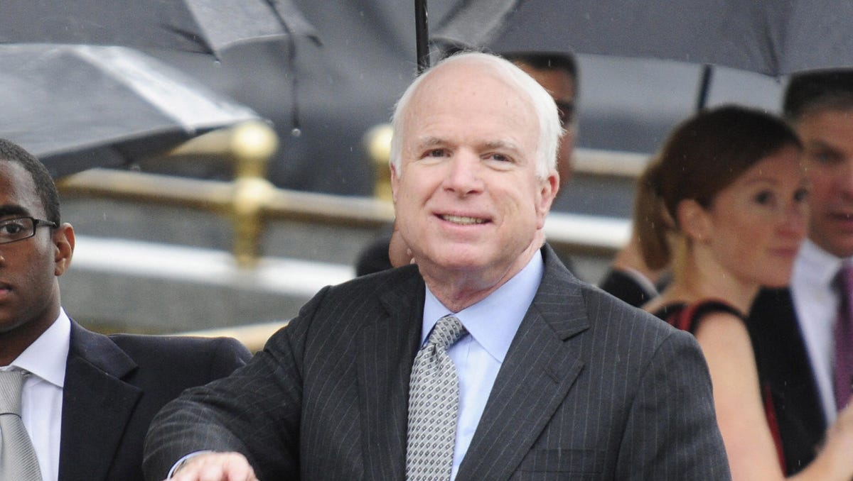 Sen. John McCain arrives for the funeral of Sen. Edward Kennedy at Our Lady of Perpetual Help Basilica for a funeral Mass in Boston on Aug. 29, 2009. President Barack Obama, three former presidents and the nation's elite gathered in the rain to attend a grand Catholic funeral for Ted Kennedy, America's legendary political patriarch.