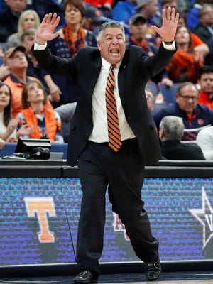 Auburn head coach Bruce Pearl yells from the sidelines during the first half in an NCAA college basketball quarterfinal game against Alabama at the Southeastern Conference tournament Friday, March 9, 2018, in St. Louis.