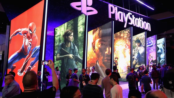 Game enthusiasts and industry personnel visit the...