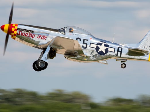 A easy P-51 World War Two fighters takes off for