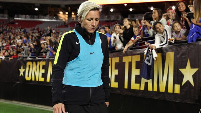 Abby Wambach of the United States warms up before taking the field against China during the second half of the women's soccer match at University of Phoenix Stadium on Dec. 13, 2015, in Glendale, Arizona.
