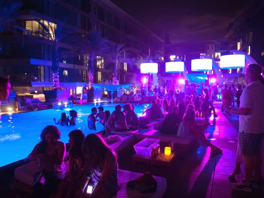 Guests enjoy a pool party at the W Scottsdale Hotel.