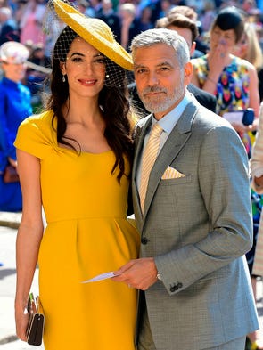Amal Clooney and George Clooney arrive for the wedding