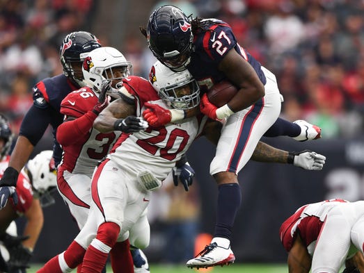Houston Texans running back D'Onta Foreman hurdles