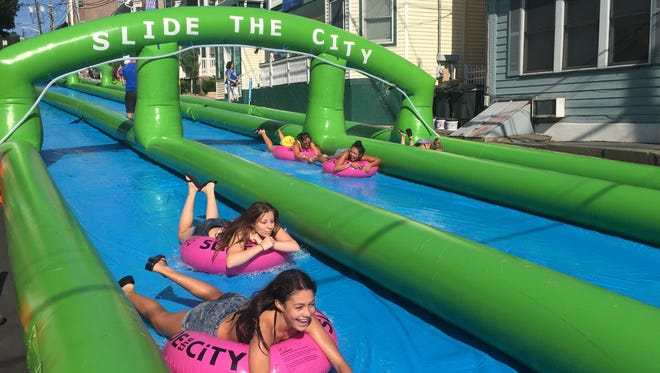 Slide the City took over downtown Nyack, New York, last month. The event saw dense crowds waiting for almost two hours to ride the attraction.