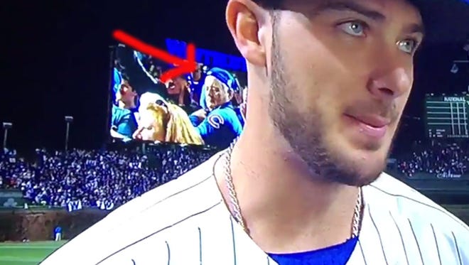 Actor Bill Murray was spotted flexing his muscles behind Kris Bryant's postgame interview.