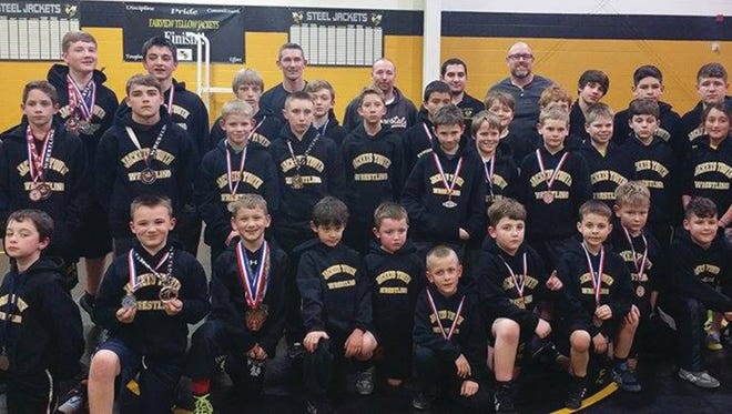 The Fairview Jacket Youth Wrestling Team poses for a group photo after competing in the Region 4 Championship on February 6, 2016.