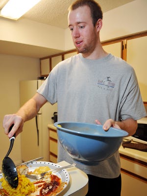 Kyle Meyer, 21, of Atlanta, lives in Melbourne and is a a 6'10' starting center for Eastern Florida State basketball team. He enjoys cooking Swedish meatballs and honey glazed almond roasted chicken and other meals for his teammates.