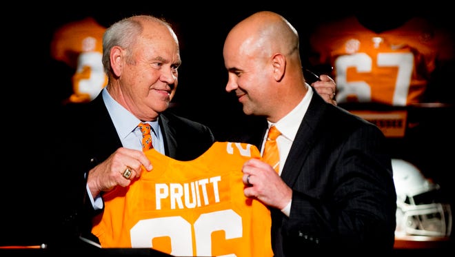 University of Tennessee Athletic Director Phillip Fulmer, left, introduces Jeremy Pruitt during his introduction ceremony as Tennessee's next head football coach at the Neyland Stadium Peyton Manning Locker Room in Knoxville, Tenn. on Thursday, December 7, 2017.
