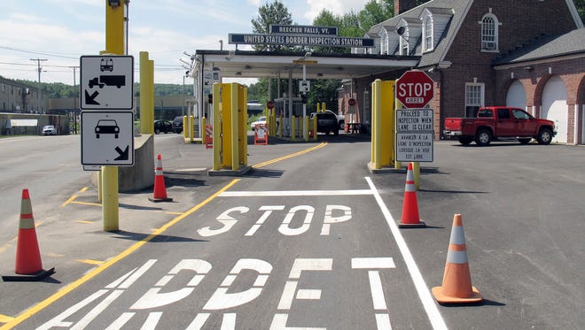 This Aug. 2, 2017 photo shows the U.S. border crossing post at the Canadian border between Vermont and Quebec, Canada, at Beecher Falls, Vt.