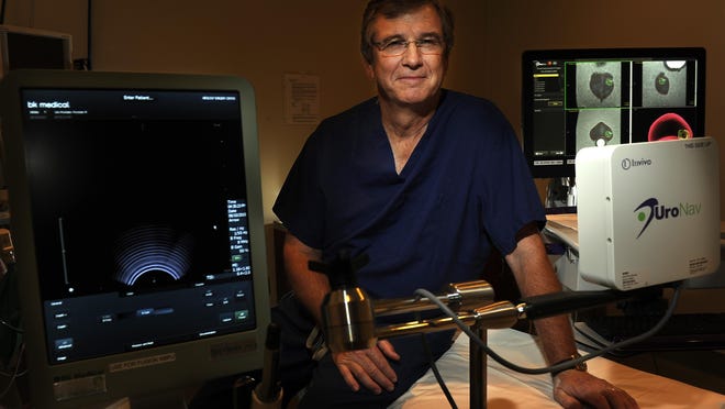 Dr. Charles Eckstein of Urology Associates use a new machine that essentially combines Google map like features with ultrasound to better find and treat prostate cancer. Wednesday June 10, 2015, in Nashville, Tenn.